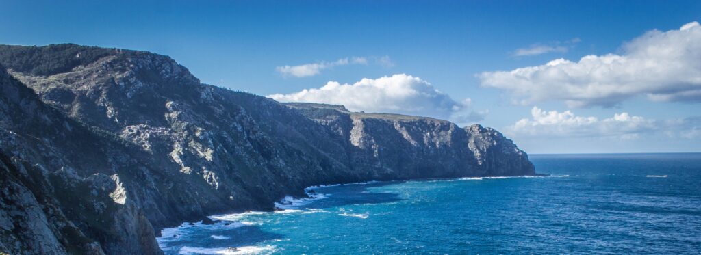 Coastal landscape with offshore energy infrastructure